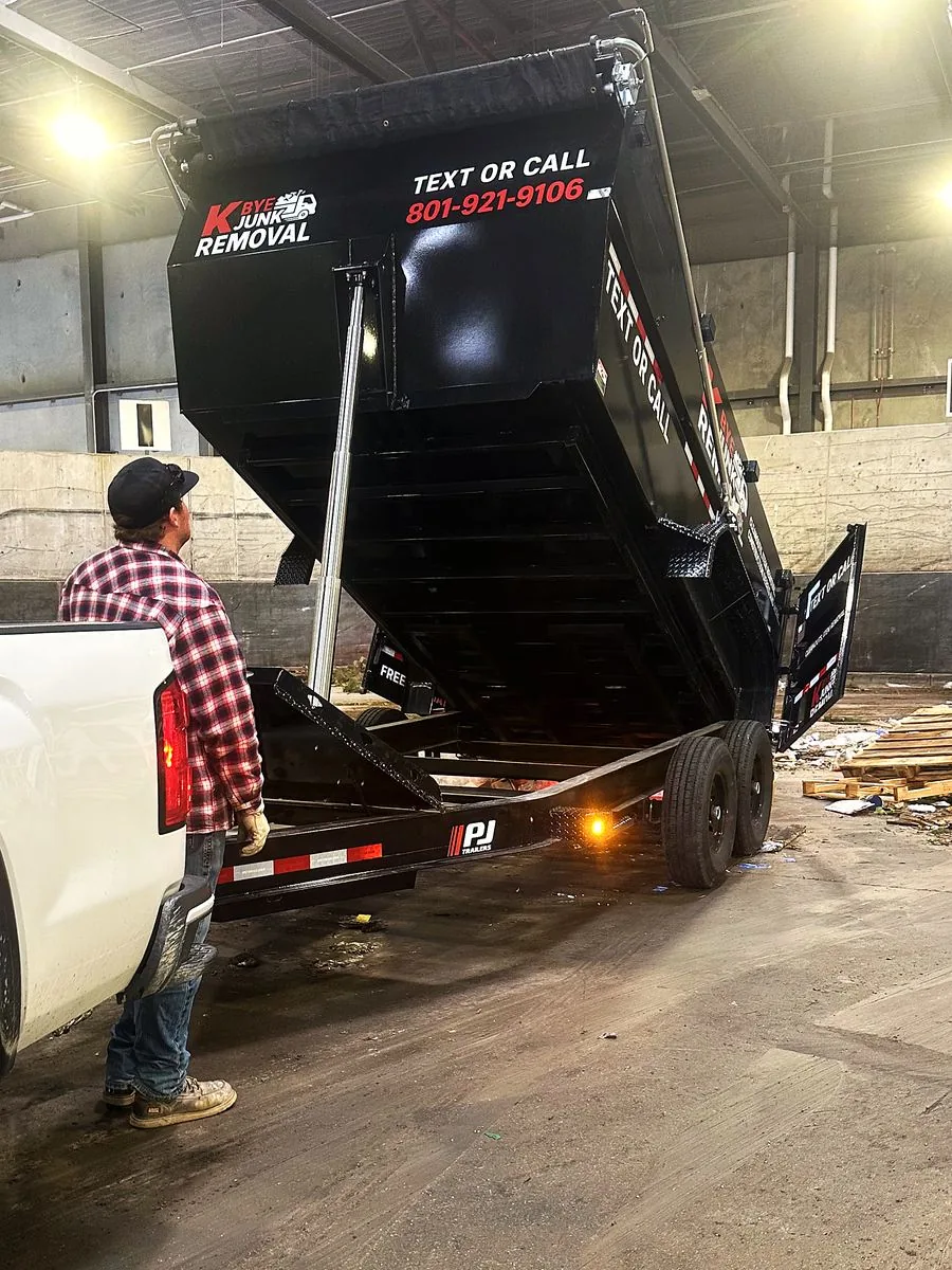 Burke Jackson next to the K Bye dump trailer